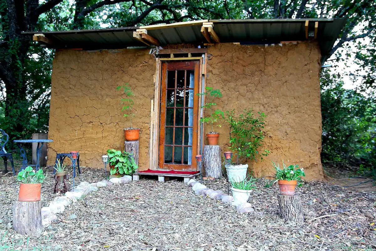 The front of the cob house, before the screened in front porch was added