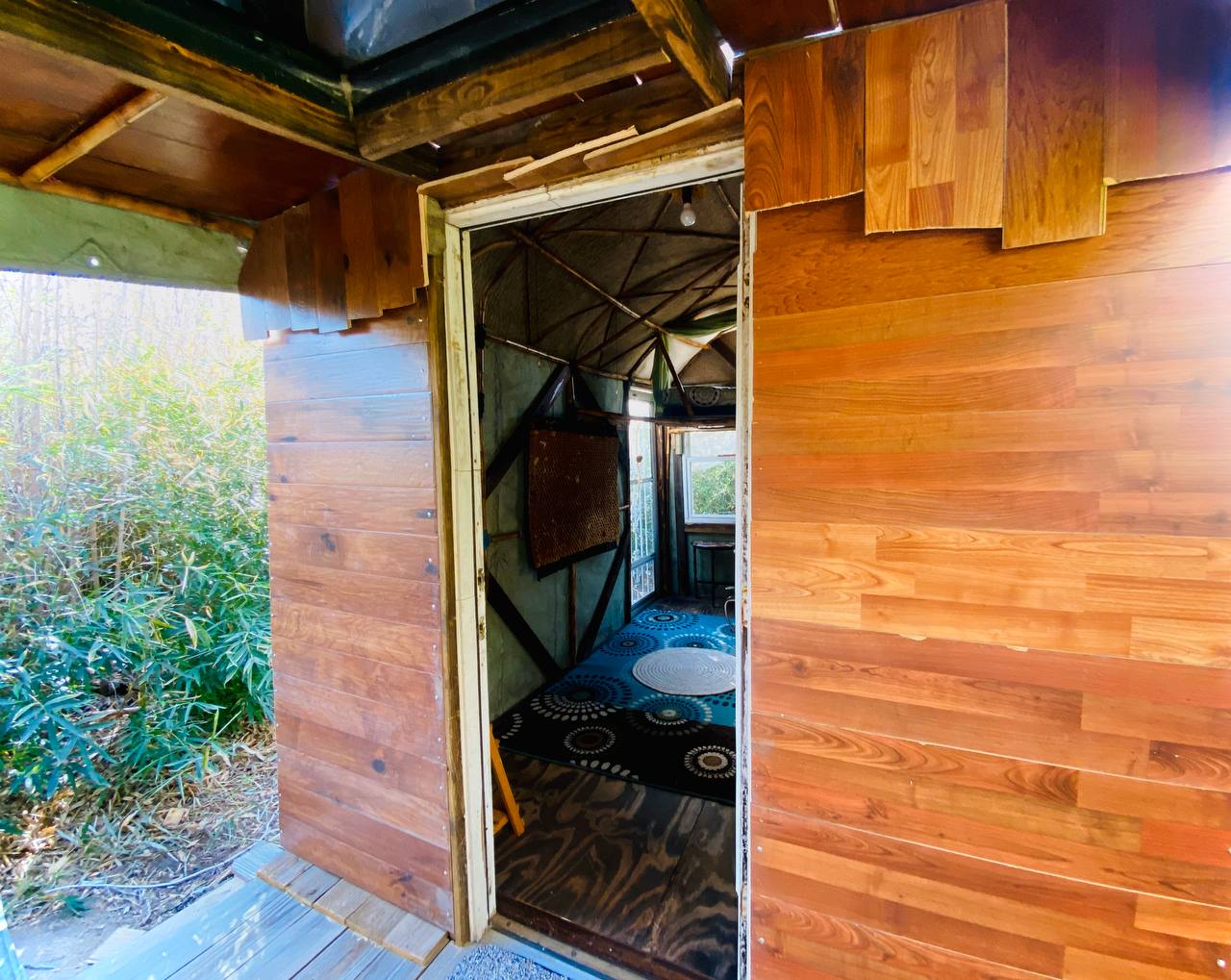 Our bamboo bungalow in the bamboo forest is crafted from 100% repurposed materials.