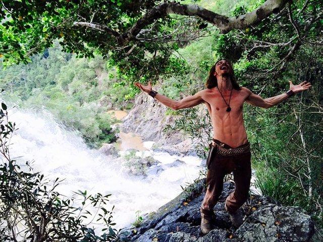 Quinn thriving at a waterfall