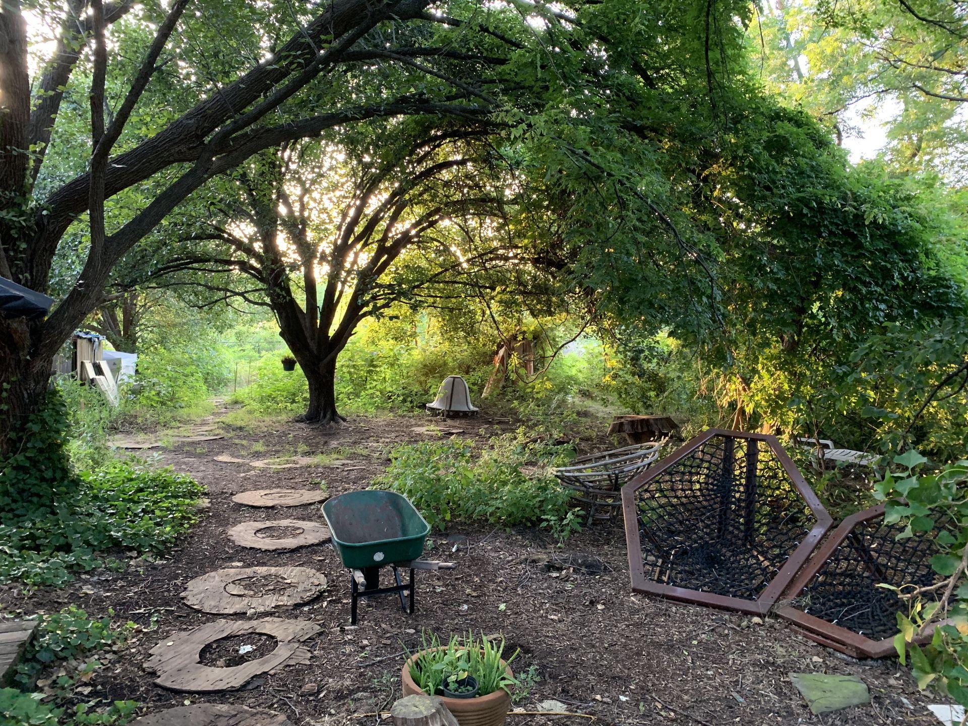 A main pathway from the main house forks towards either the garden or well shower at The Garden of Eden.