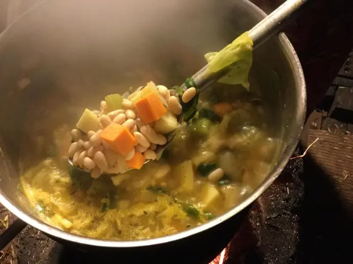 White Bean Soup cooked over fire at The Garden of Eden